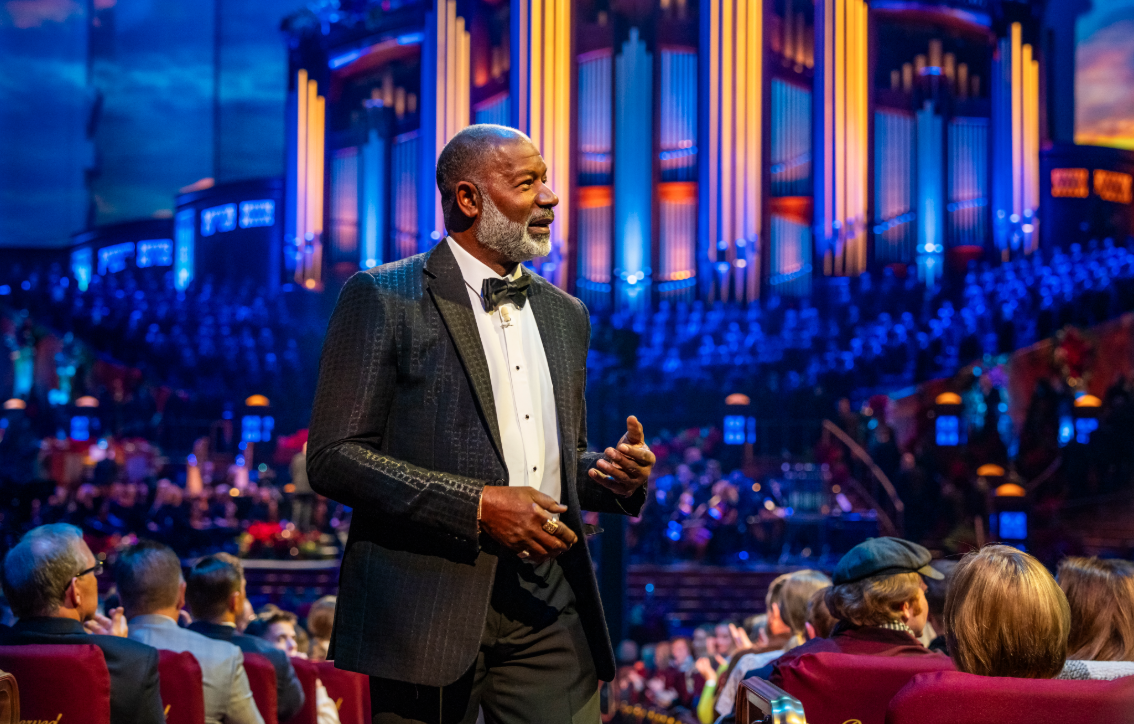 Actor Dennis Haysbert wearing a tuxedo standing in the audience
